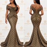 Robe sirène noire et dorée en brocard